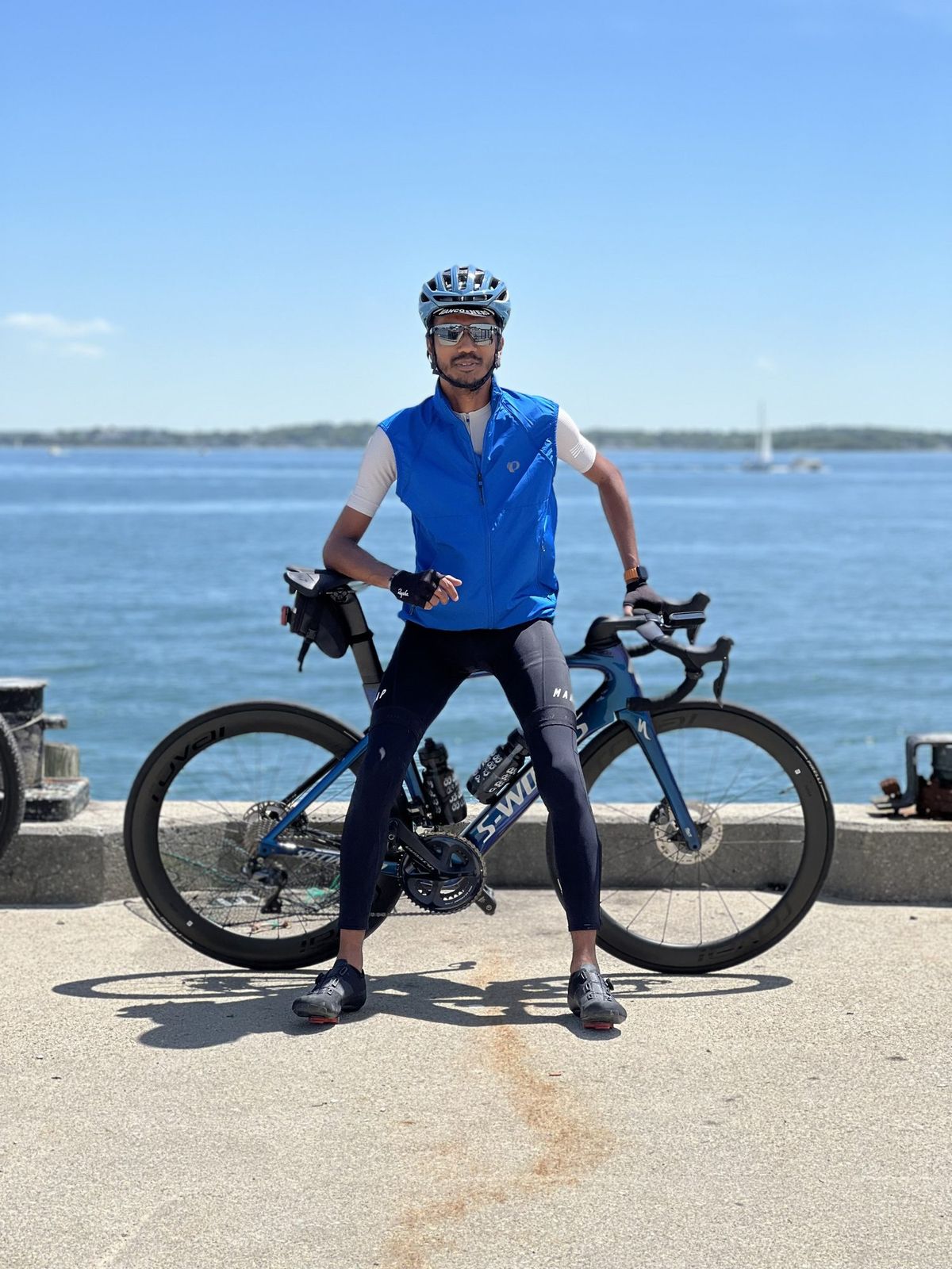 Vinesh Sinha with his road bike by the sea